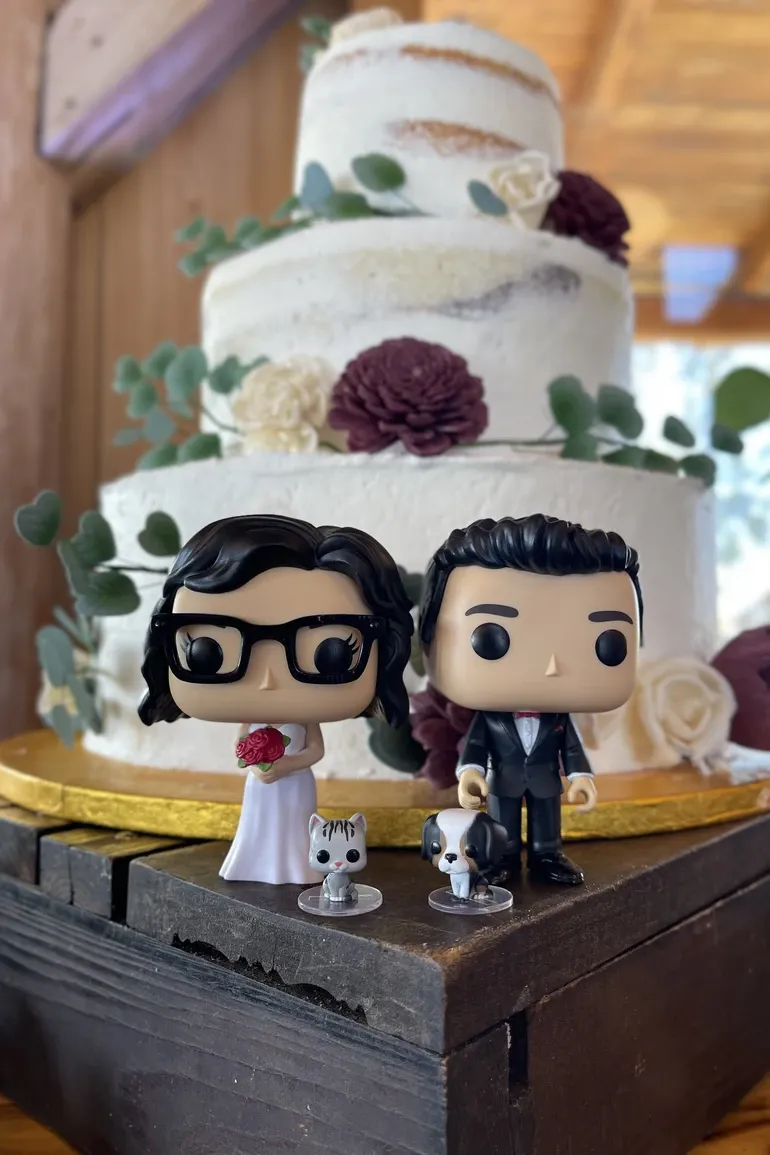 Naked cake with custom bride and groom figurines