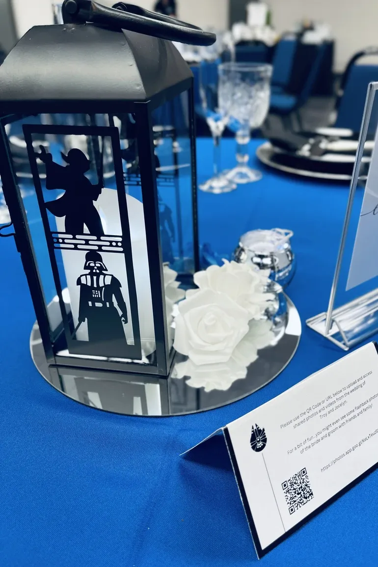 Darth Vader lantern centerpiece on a blue tablecloth