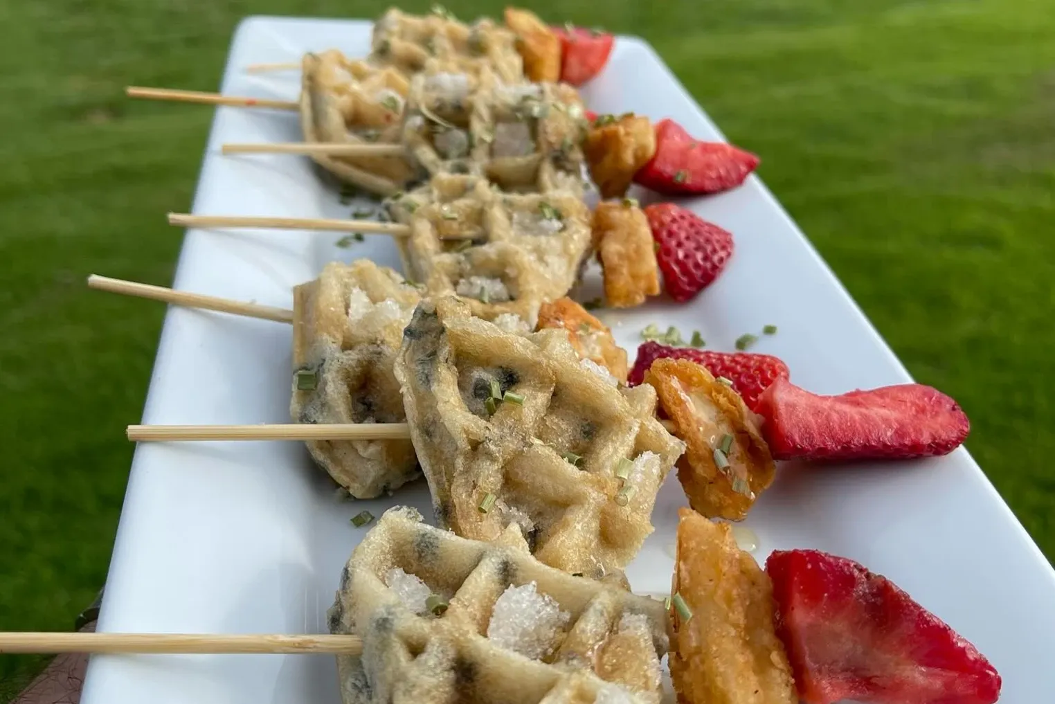 Chicken and waffle skewers with fresh strawberries