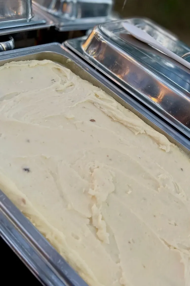 Creamy mac and cheese in a serving tray