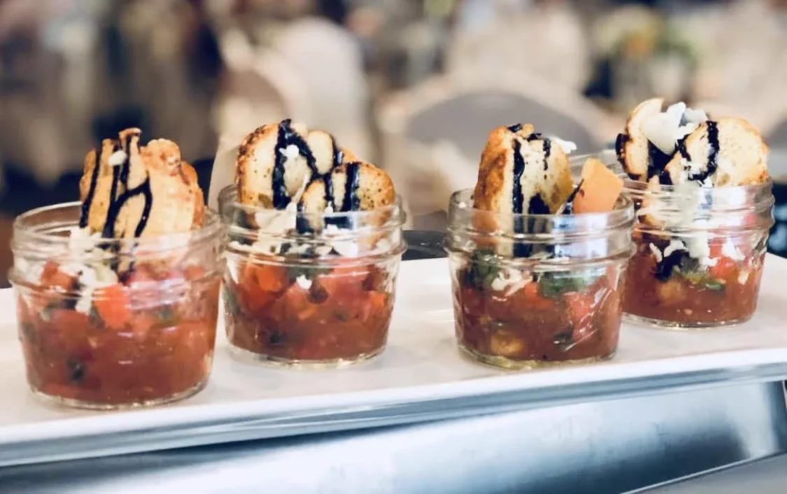 Shrimp cocktail served in individual glass jars