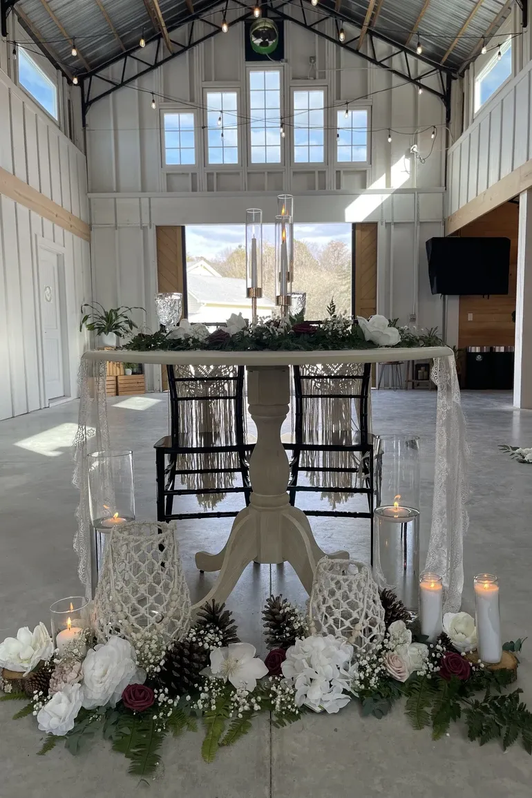 Sweetheart table in a bright white hall